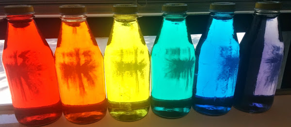 Rainbow colored bottles