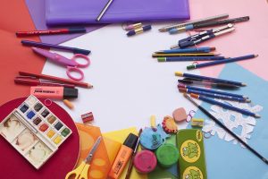 Rainbow colored art and school supplies