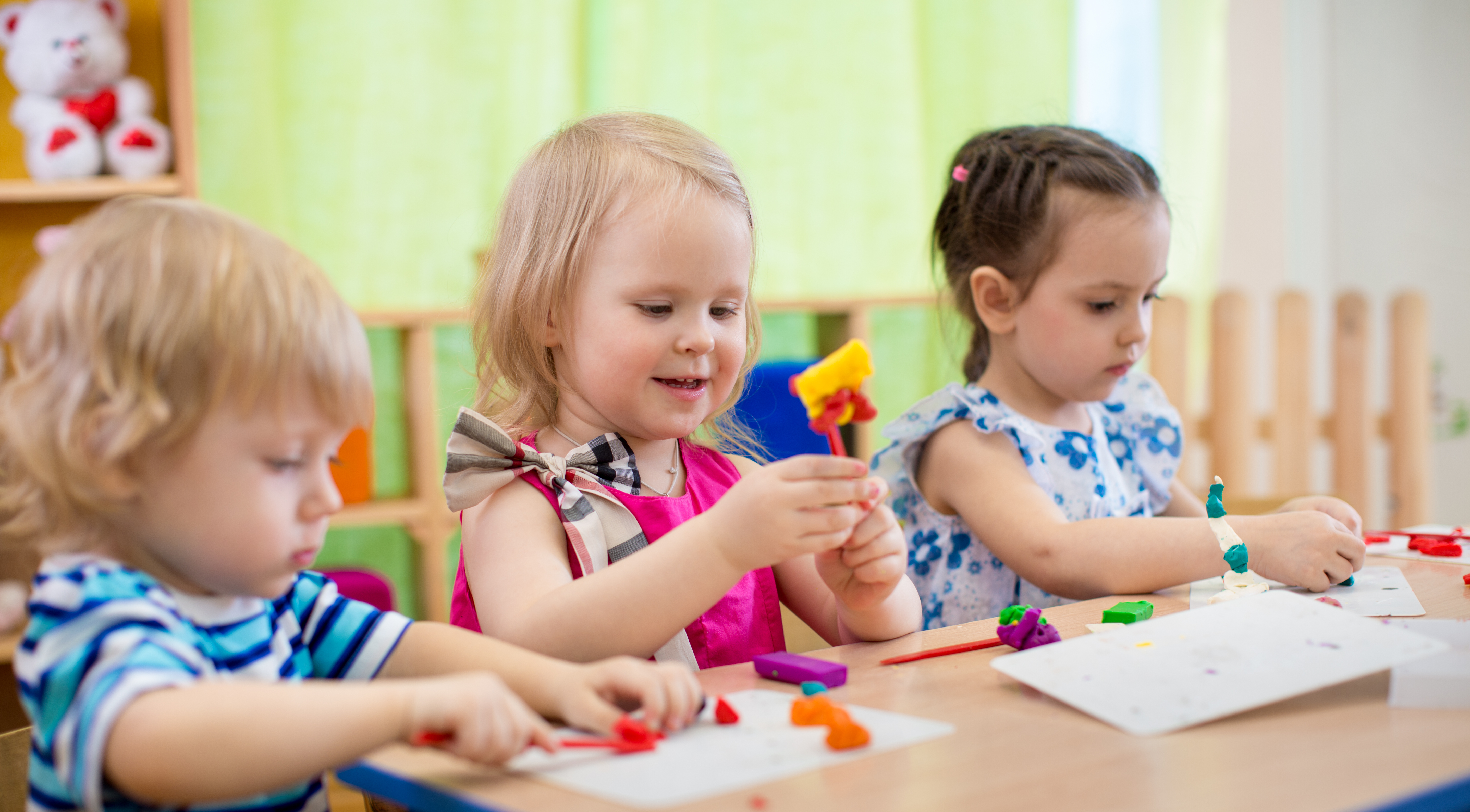 Children making arts and crafts in daycare