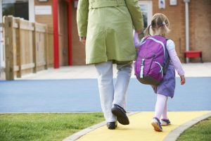 Mother Walking Child to Preschool